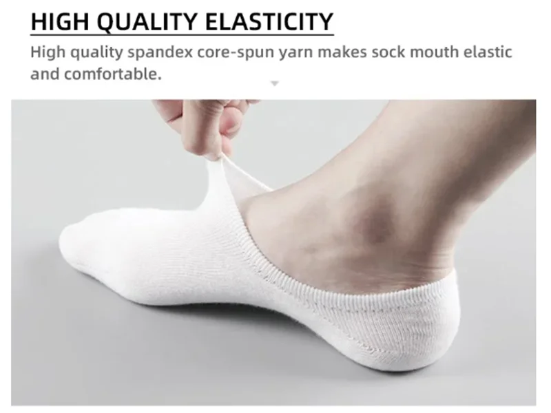 A close-up of a white invisible silicone no-show boat sock being worn on a foot.