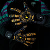 A close-up of a hand wearing black and gold goalkeeper gloves with a green and purple striped shirt.