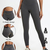 A model wears dark gray high-waist yoga leggings demonstrating V-shape design and hip lift features.