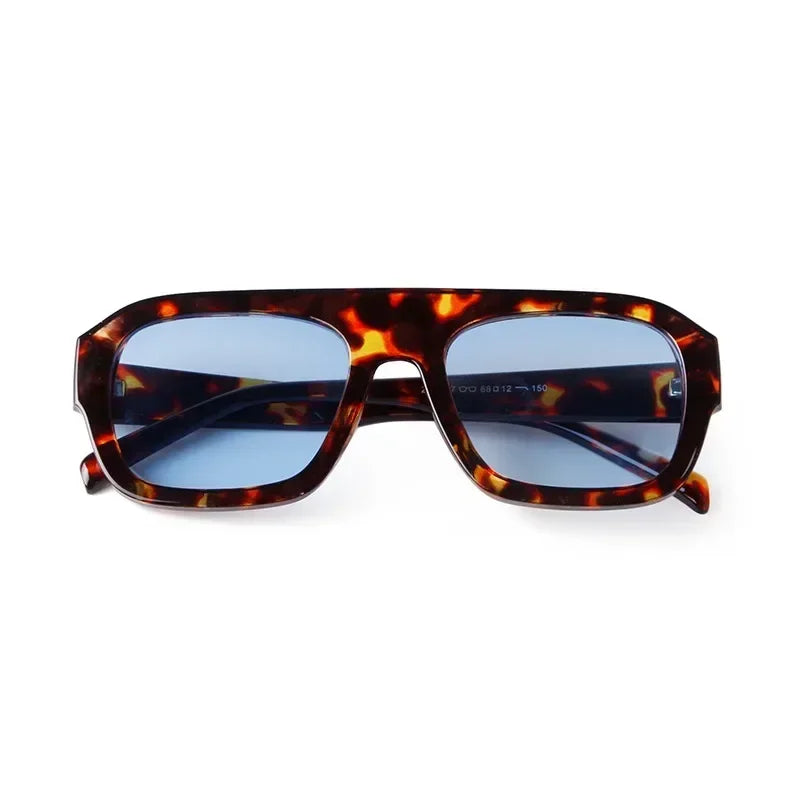 Vintage oversized square sunglasses with a tortoiseshell pattern lens and frame.