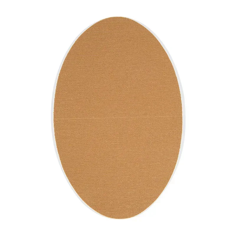 A beige, oval-shaped anti-wear thigh patch for friction relief.