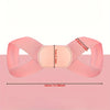 A pink adjustable posture corrector belt shown flat on a surface with measurements displayed.