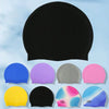 A collection of colorful silicone swim caps in various shades including blue, purple, gray, pink, yellow, and black.