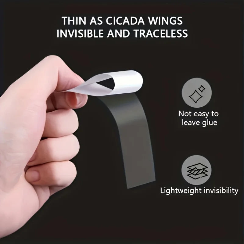 A hand holds a thin, silver adhesive tape against a dark background, demonstrating its lightweight and traceless properties.