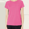 A woman wearing a bright pink quick dry moisture-wicking gym t-shirt and black pants.