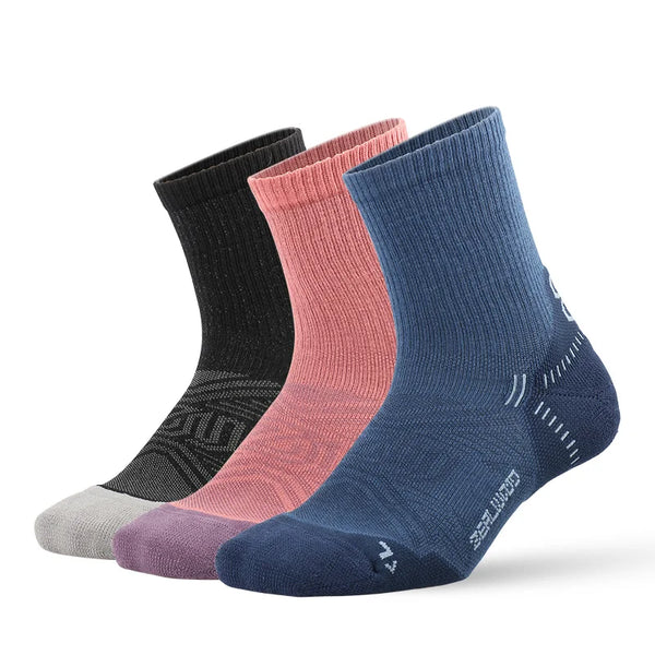A stack of five breathable performance running socks in various shades of pink, black, and blue.