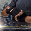 Black durable Velcro cycling gloves being held by a hand, showing wrist support structure.