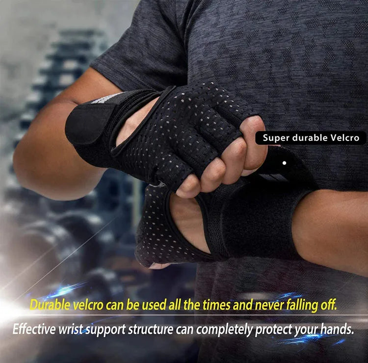 Black durable Velcro cycling gloves being held by a hand, showing wrist support structure.