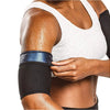 A person wearing black arm slimming compression bands on their upper arm during a workout.