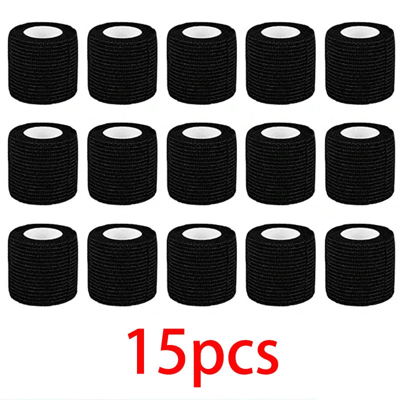 Fifteen black tattoo grip bandage tapes arranged in a grid.