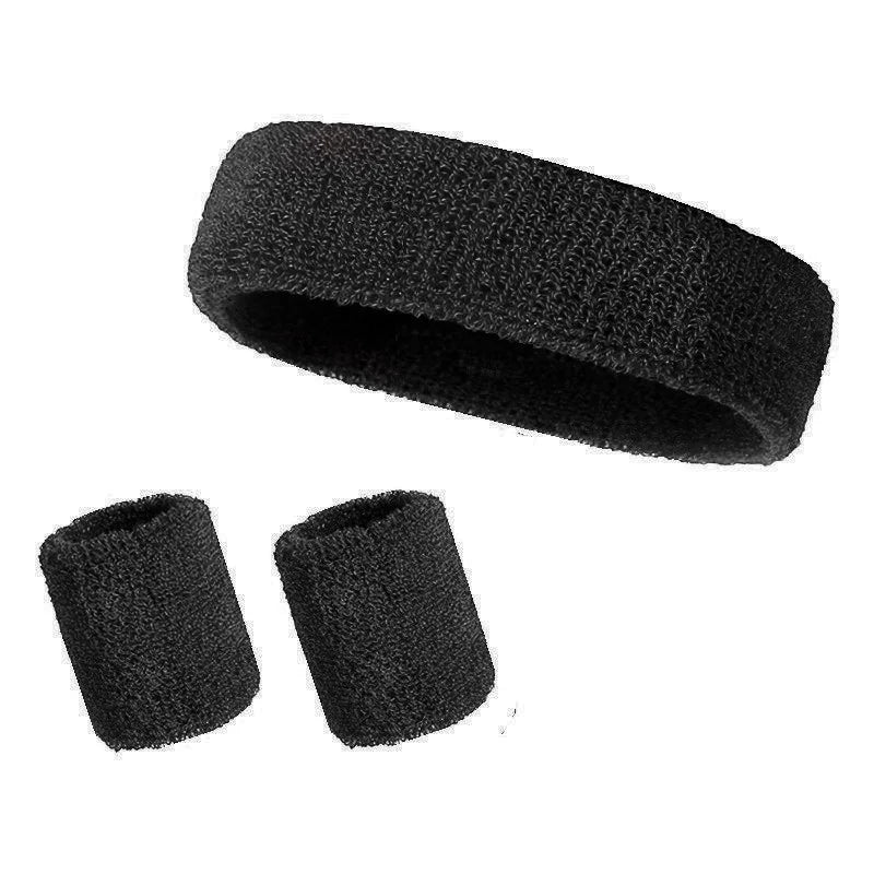 A set of three black athletic sweatbands or hairbands.