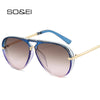 Retro pilot sunglasses with gradient lenses featuring blue frames and gold accents.