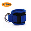 One piece of blue and black adjustable neoprene ankle straps for leg training.