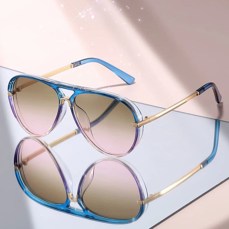 Pair of classic gradient aviator sunglasses with blue frames and rose gold accents