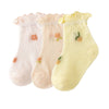 A pack of three thin summer casual baby socks in pink, beige, and yellow.