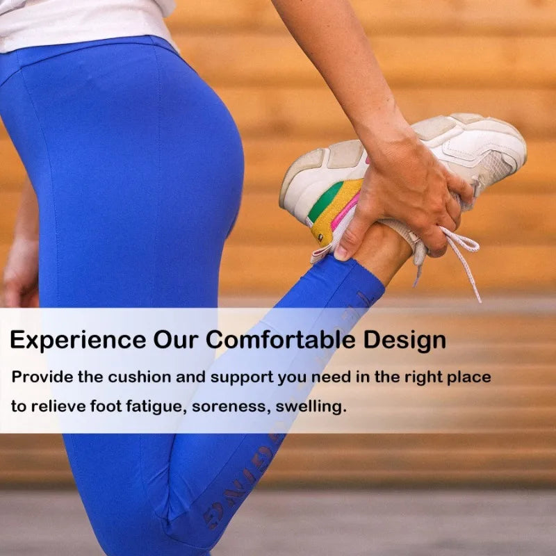 Close-up of a woman wearing blue athletic leggings and white performance ankle socks with colorful laces.