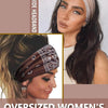 A woman models an oversized women's non-slip headband with a boho print design.