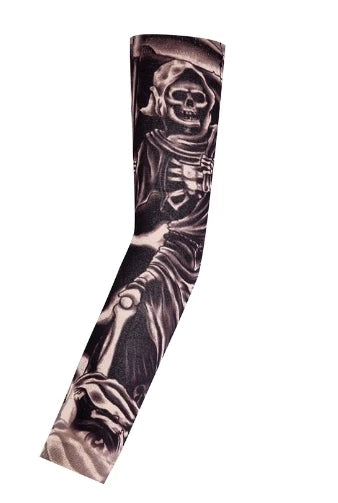 A black and grey tattoo sleeve featuring a skull design on an arm.