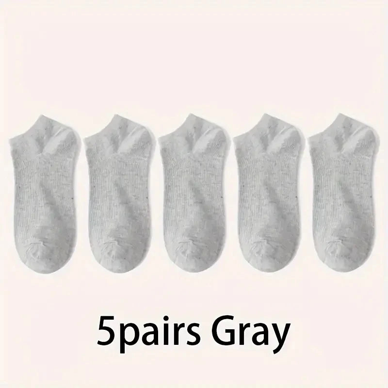 Five pairs of gray comfort fit ankle socks laid out in a row.
