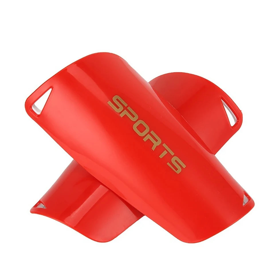A bright red soccer shin guard is shown from an angled view.