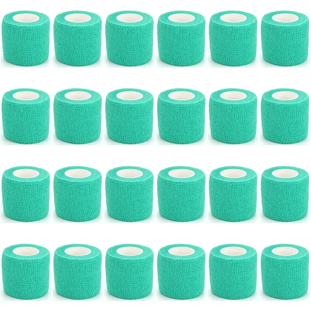 Rolls of teal self-adhesive sports bandages stacked in a row.
