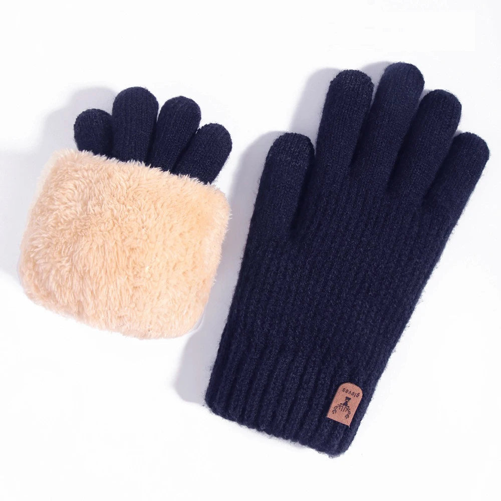 A pair of navy blue knit gloves with a light tan faux fur palm and touchscreen technology.
