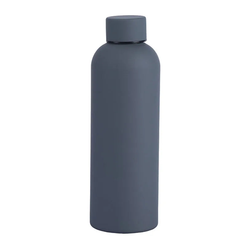 A matte gray insulated stainless steel thermos cup with a black lid.