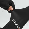 A close-up shot of a black sports arm sleeve being worn on an arm.