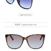 Brown leopard grain tea cat eye sunglasses with dark lenses