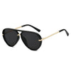 Black retro pilot sunglasses with gold accents and gradient UV400 lenses
