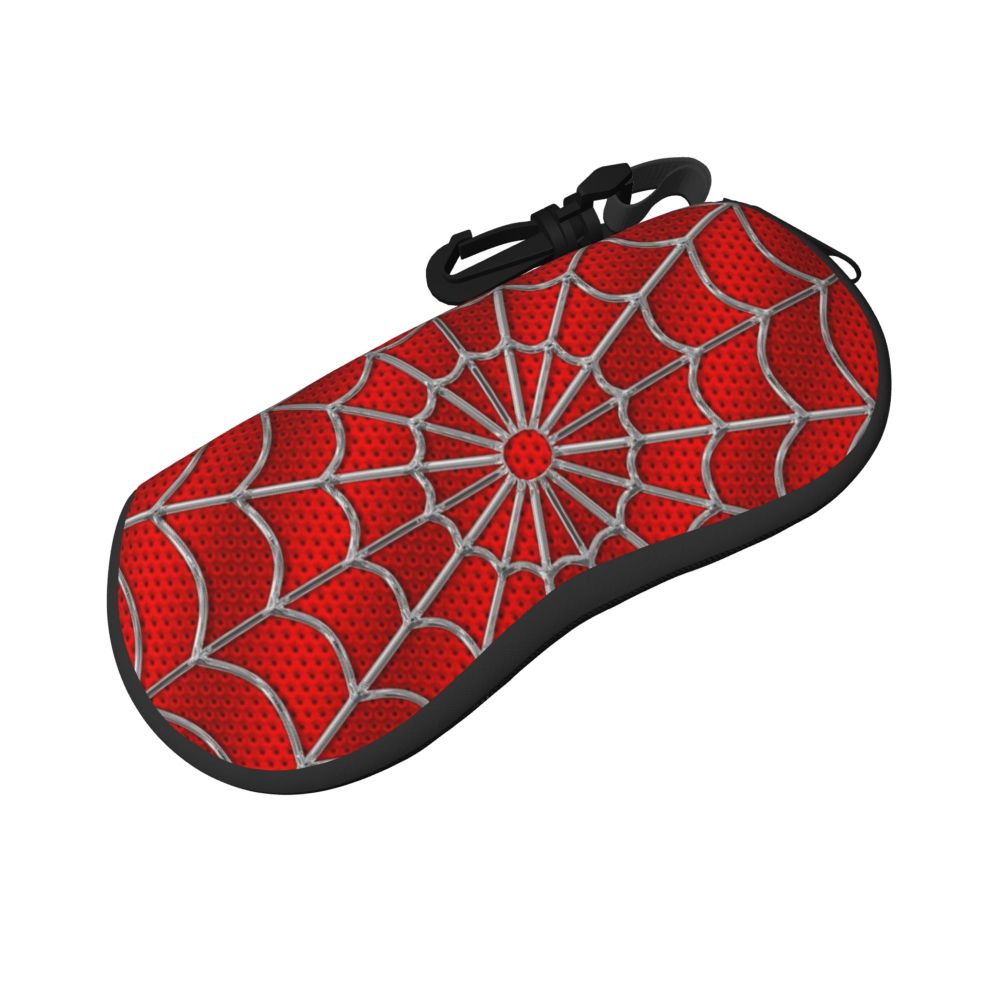 A red and gray spider web patterned pouch with a black strap.