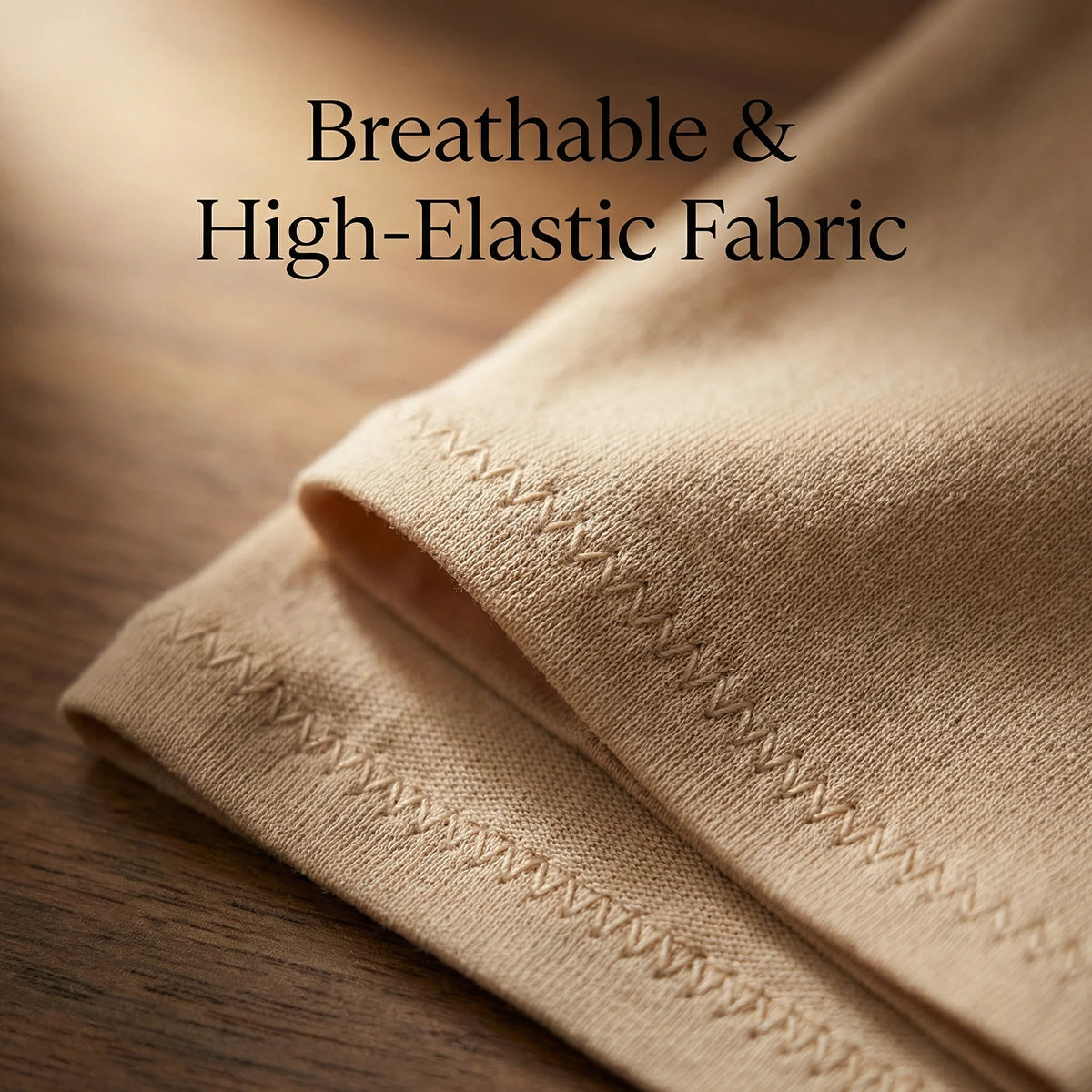 Close-up of a tan, breathable and high-elastic fabric textile being folded or layered.