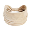 Un foulard en coton bohème beige noué en nœud, montré sur fond blanc.