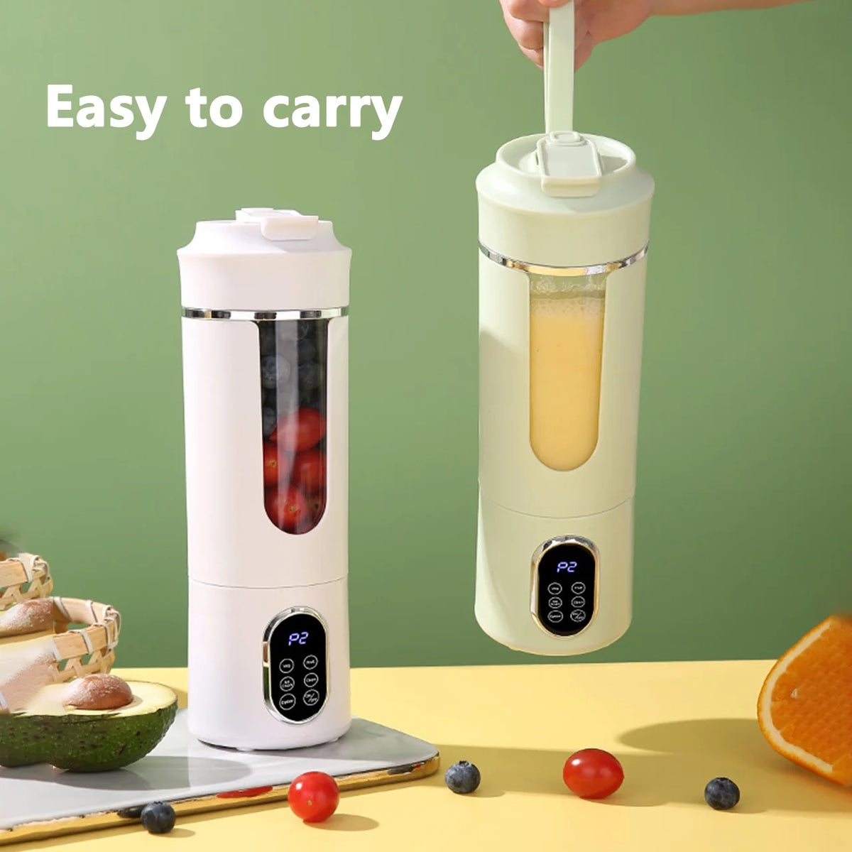 A white portable electric juicer is shown next to fresh fruit and berries on a yellow surface.