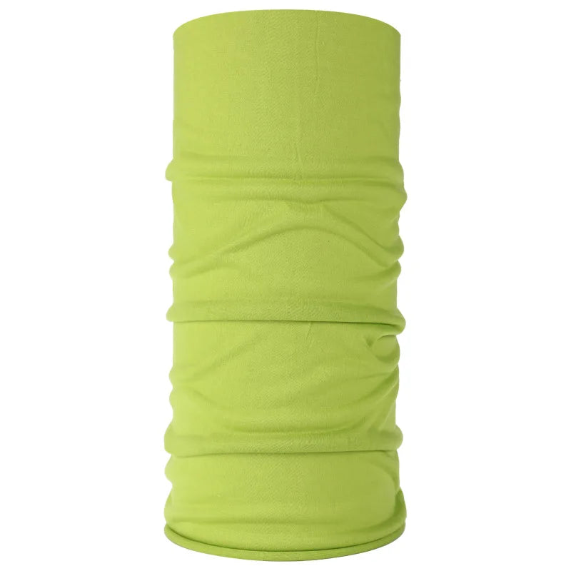 A cylindrical lime green seamless fabric headband or balaclava.