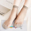 A pair of beige ultra-thin breathable ankle socks worn on a person's feet against a light background.