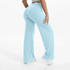 A person is modeling light blue high-waist yoga pants.