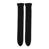 A pair of black opaque thigh high elastic socks for women.