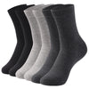 Une rangée de chaussettes de coton premium à col roulé dans diverses nuances de gris et de noir, présentées verticalement.