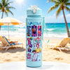 A light blue cartoon character water bottle with a carrying strap standing on a white surface near a beach.