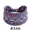 Boho knotted cotton headband featuring a vibrant geometric pattern in purple, blue, and orange tones.