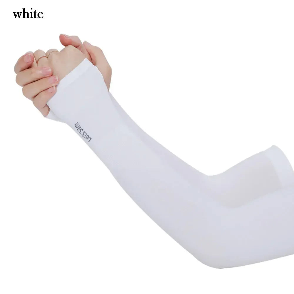 A person is wearing a white, long-sleeved arm sleeve for sun protection.