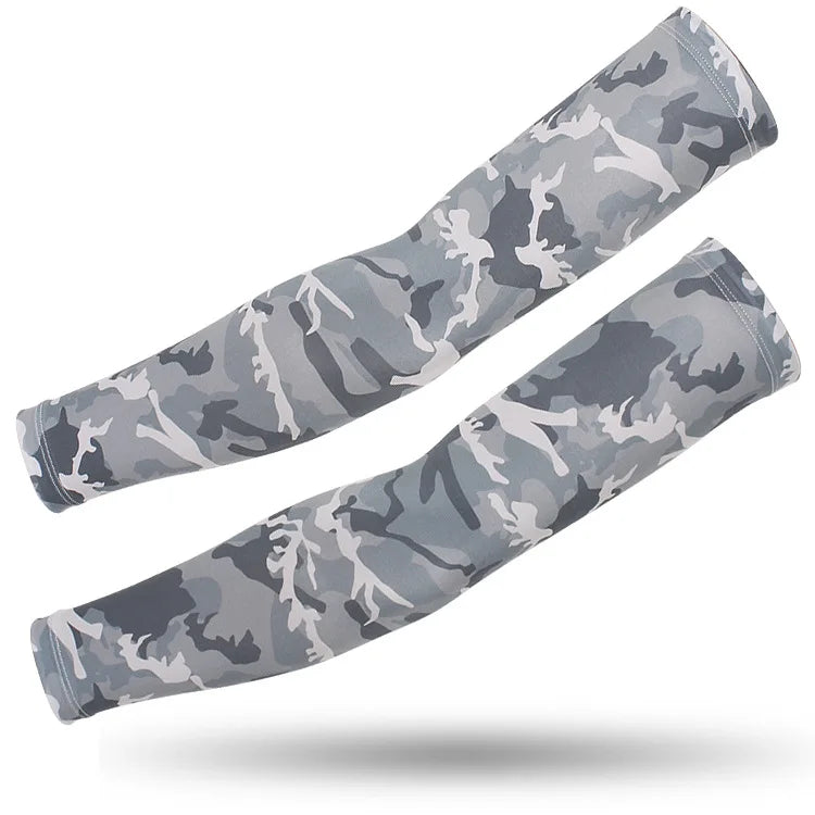 A pair of camouflage tactical arm sleeves stretched out against a white background.