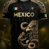 A black soccer jersey featuring a gold Mexico national team design with an Aztec calendar style pattern and a fierce eagle gr