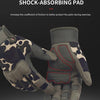A close-up of a dark gray full finger mitten with a red shock-absorbing pad on the palm, shown in use.