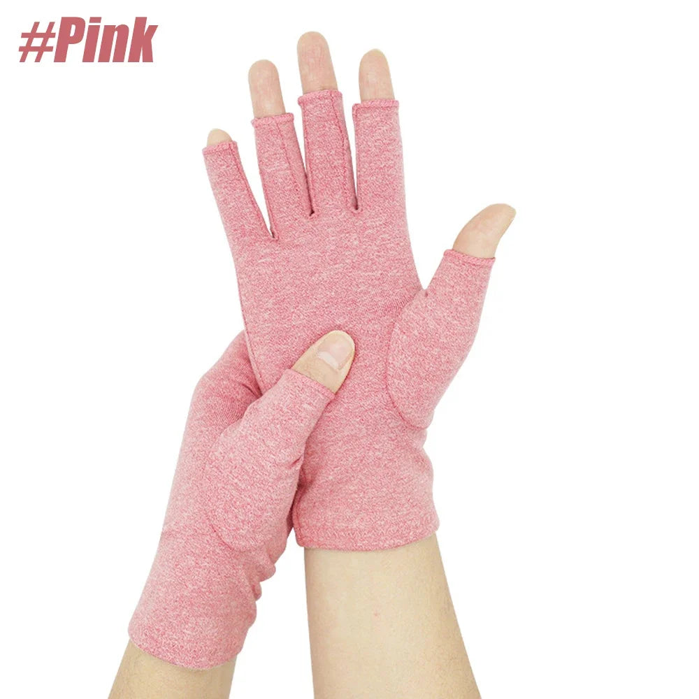 A pair of pink comfort compression hand gloves being worn on a hand.