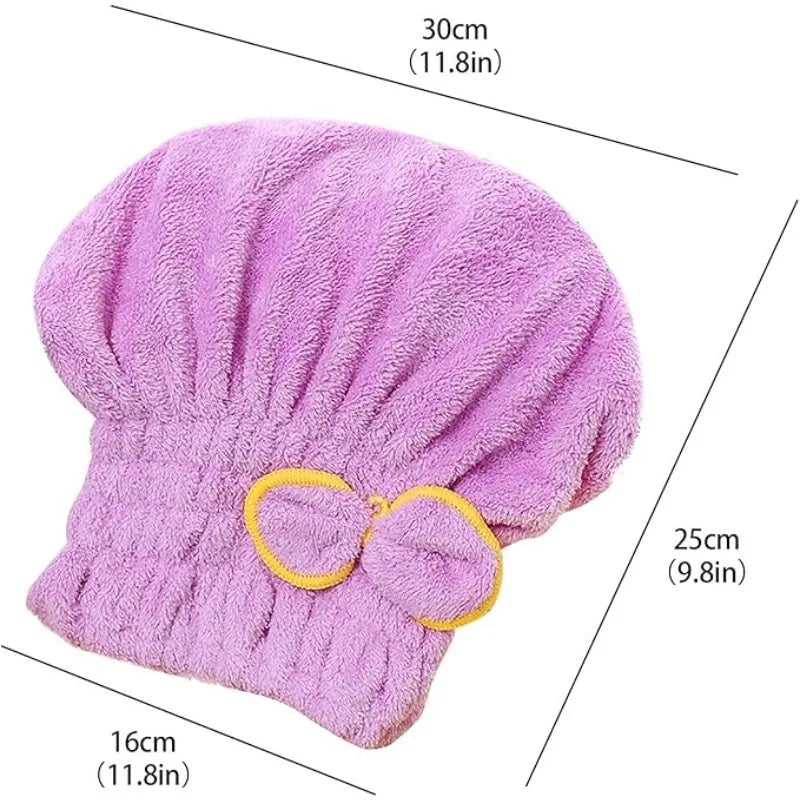 A fluffy pink hair drying towel cap with a gathered design.