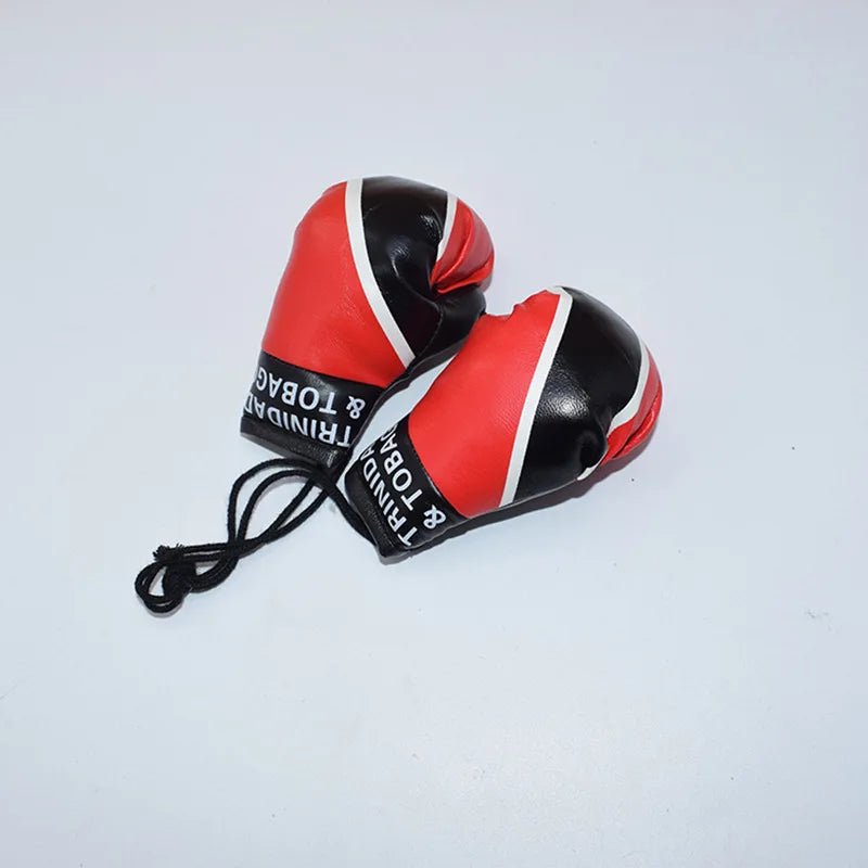 Mini rotes und schwarzes Kunstleder-Boxhandschuh-Anhänger mit Trinidad & Tobago-Branding