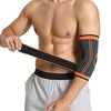 A man wearing a black and orange joint support elbow protector sleeve on his forearm.