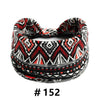 A black, white, and red patterned boho cotton turban headband for workout or yoga.